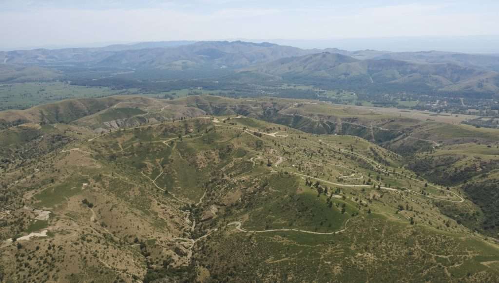 Rolling green hills and a winding road in Azerbaijan.