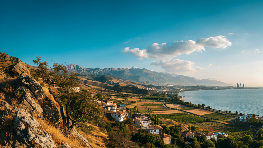 Coastal hills with farmland and a bay in Azerbaijan.