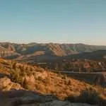 Arid hills and rocky ridges stretch across the landscape in Azerbaijan.