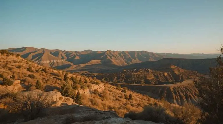 Arid hills and rocky ridges stretch across the landscape in Azerbaijan.
