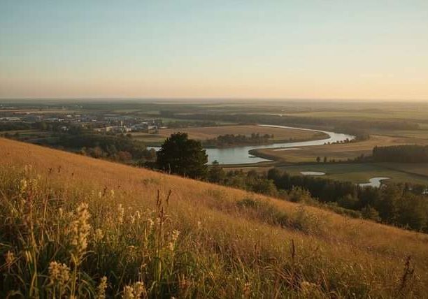 A winding river through fields and hills in Belarus.