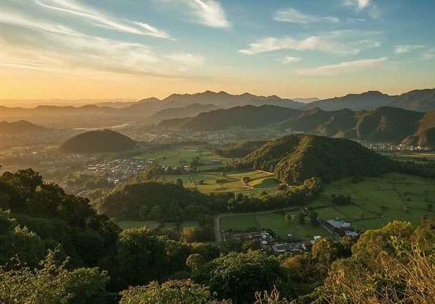 Mountainous green valley at sunset in Thailand.